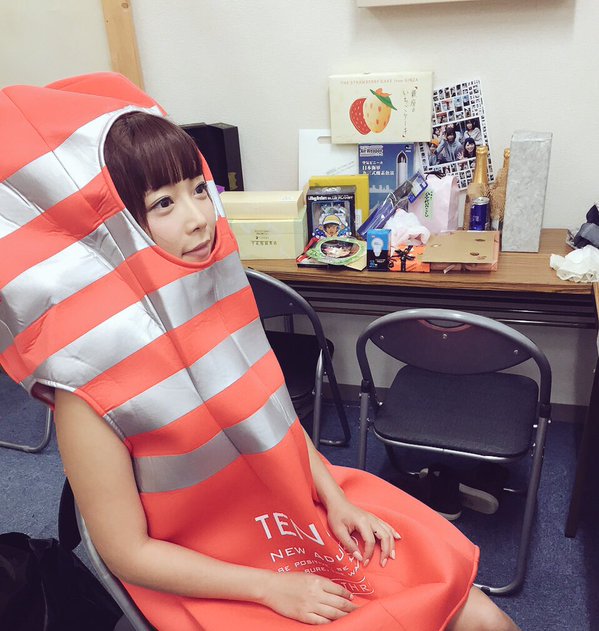 A Japanese woman dressed as a Tenga hole